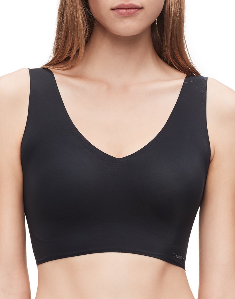 Buy Calvin Klein Women's Invisibles Comfort Seamless Lightly Lined V Neck  Bralette Bra, Nymph's Thigh, Large at